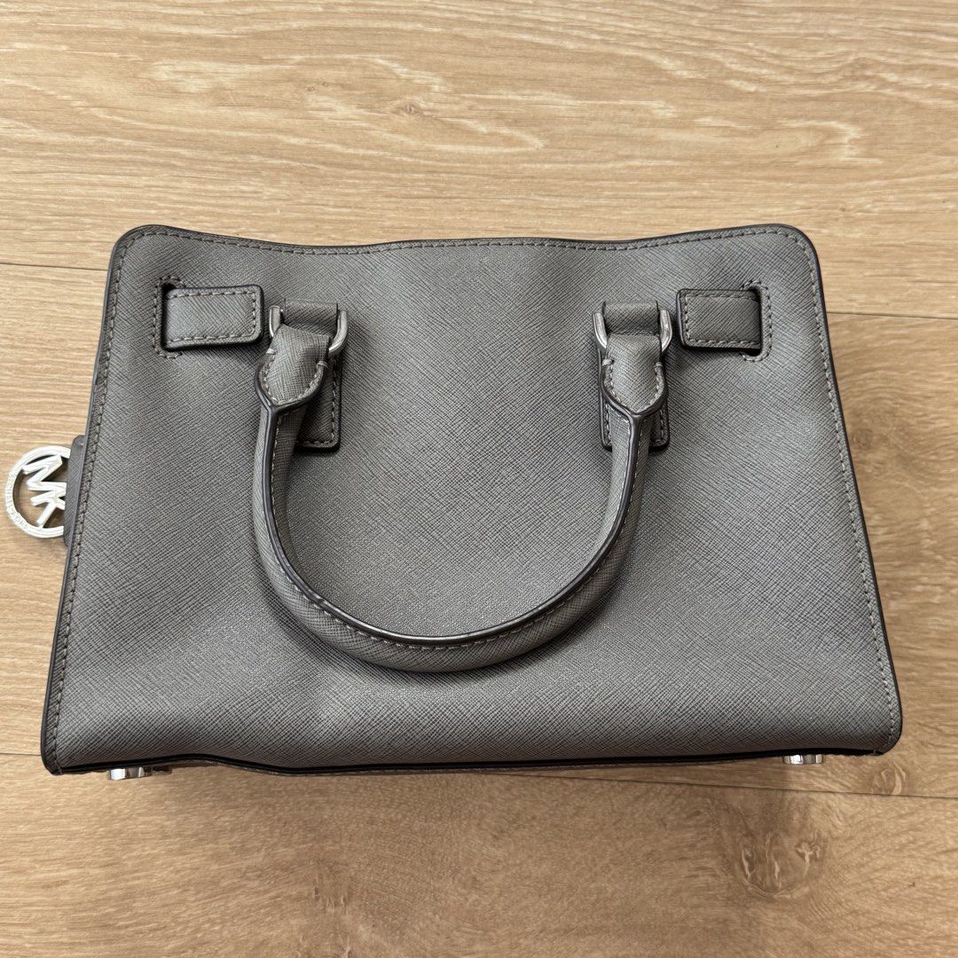 Michael Kors Dillon Saffiano Satchel - Gray (Category: Luxury Bags & Wallets) located in San Fernando. Submitted by samxyams (Listing ID 1423820211, Image 2). Description: Michael Kors Dillon Saffiano Satchel - GRAY ‼️ strictly no to choosy buyers ‼️ - 8/10 condition - like new with minimal stains (see photos) - with body strap - selling as is rfs: decluttering 📍pampanga 🚚 j&t / lbc 💵gcash, maya, metrobank, gotyme.