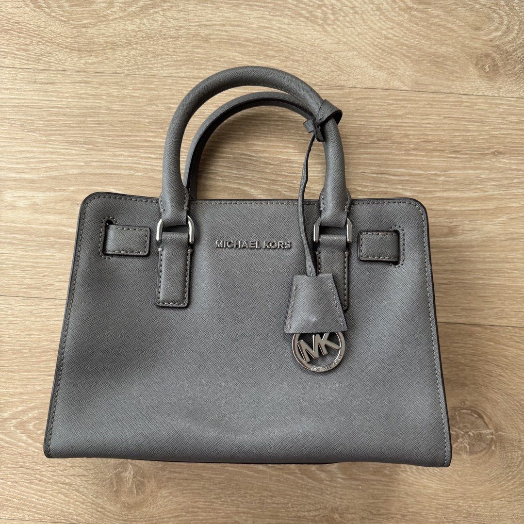 Michael Kors Dillon Saffiano Satchel - Gray (Category: Luxury Bags & Wallets) located in San Fernando. Submitted by samxyams (Listing ID 1423820211, Image 1). Description: Michael Kors Dillon Saffiano Satchel - GRAY ‼️ strictly no to choosy buyers ‼️ - 8/10 condition - like new with minimal stains (see photos) - with body strap - selling as is rfs: decluttering 📍pampanga 🚚 j&t / lbc 💵gcash, maya, metrobank, gotyme.