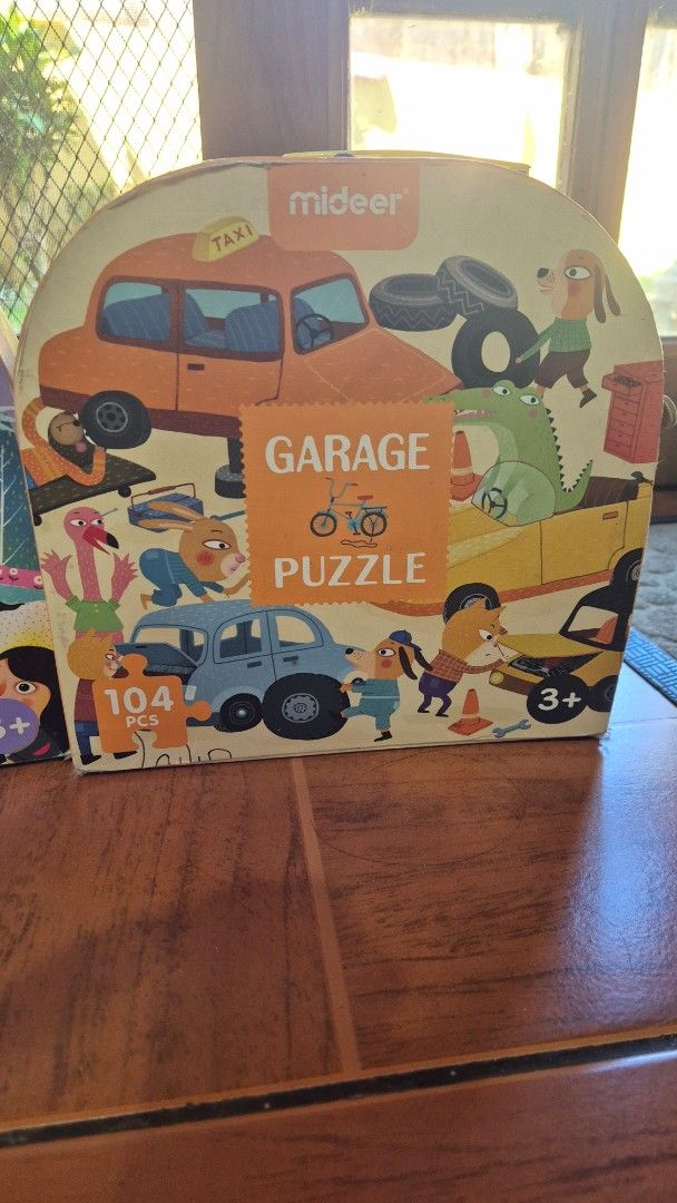 Mideer Floor Puzzle Set (Category: Board Games & Puzzles) located in Paranaque City. Submitted by mariel_ (Listing ID 1423839655, Image 2). Description: - 4 Mideer Puzzles included: Dinosaur Age (104 pcs), Our World (100 pcs), Sleeping Beauty (104 pcs), and Garage (104 pcs). - Suitable for ages 3+. - Each puzzle comes in a round box with a handle. -All complete pieces, boxes dented but otherwise the puzzle pieces are all intact. Photo guides insi