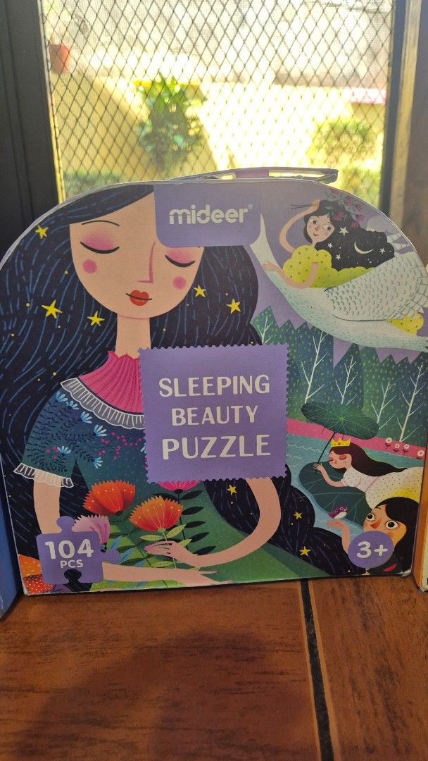 Mideer Floor Puzzle Set (Category: Board Games & Puzzles) located in Paranaque City. Submitted by mariel_ (Listing ID 1423839655, Image 3). Description: - 4 Mideer Puzzles included: Dinosaur Age (104 pcs), Our World (100 pcs), Sleeping Beauty (104 pcs), and Garage (104 pcs). - Suitable for ages 3+. - Each puzzle comes in a round box with a handle. -All complete pieces, boxes dented but otherwise the puzzle pieces are all intact. Photo guides insi