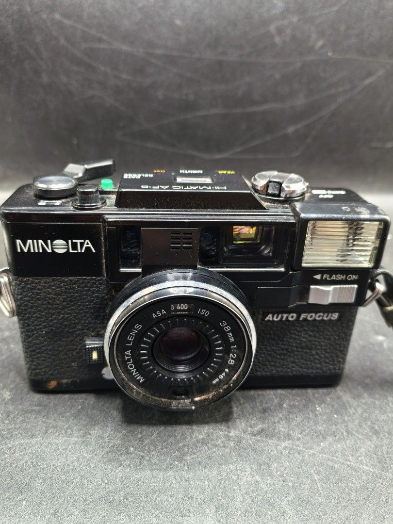 Minolta Hi-Matic AF2 (Category: Cameras) located in Cebu City. Submitted by dudes_villanueva (Listing ID 1423820265, Image 1). Description: Minolta Hi-Matic AF2 Note: Tested Functional Shutter. Flash not Working. Tarnish discoloration on battery terminal still working. As is to all other functions. All sales final and non-refundable. Battery not included for testing and demo only. 📌Minolta Hi-Matic AF-D 35mm autofocus film camera from the early 