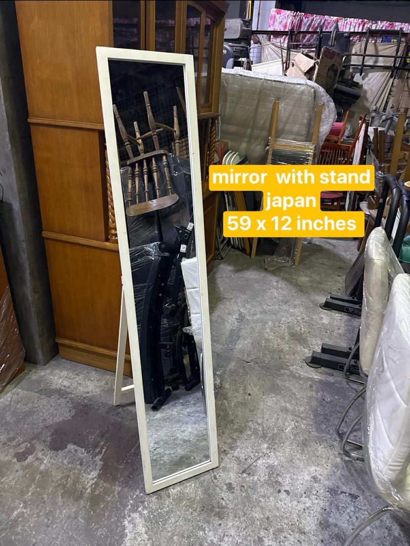 Mirror with Stand - Japan (Category: Mirrors) located in Quezon City. Submitted by mikesiawingco (Listing ID 1423916690, Image 1). Description: - Authentic Japanese mirror - Dimensions: 59 x 12 inches - White frame - Rectangular, full-length mirror - Ideal for bedroom or dressing area - Simple and functional design.