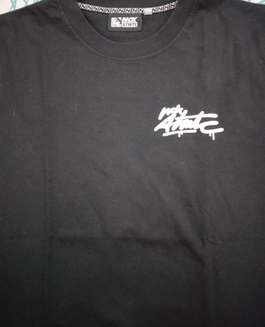 Nick Automatic Black Graphic Tee (Category: Tshirts & Polo Shirts ) located in Caloocan City. Submitted by newcat66 (Listing ID 1423868191, Image 1). Description: - Black Nick Automatic t-shirt - Front logo - Large reaper graphic on the back - Crew neck - Brand name printed on neckline - Soft material.