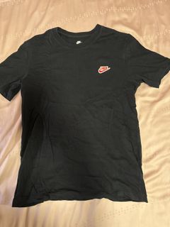 black nike top with red tick