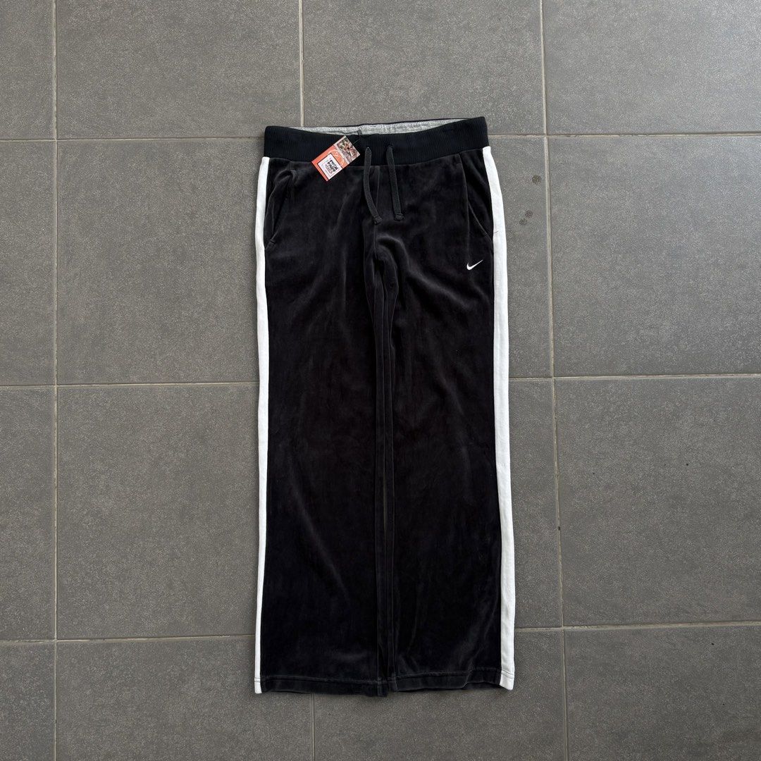 Nike Velour Track Pants with White Stripes (Category: Joggers) located in San Jose del Monte. Submitted by afrodrygoods (Listing ID 1423914574, Image 1). Description: 🏷️ Nike Velour Track Pants - Nike Can send when worn picture if requested -Size on tag: -W:‘’30 -L: “36 -leg opening: “9 -condition: like new 🚚Courier: J&T/Lalamove. 💳Payment: Gcash/Bank Transfer. 📍Location: Fairview, Qc. & SJDM, Bulacan Please see description and double check p