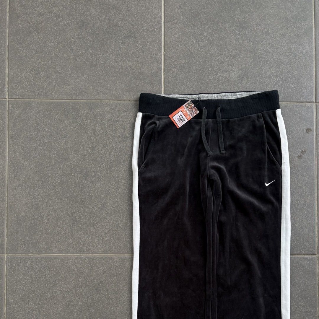 Nike Velour Track Pants with White Stripes (Category: Joggers) located in San Jose del Monte. Submitted by afrodrygoods (Listing ID 1423914574, Image 2). Description: 🏷️ Nike Velour Track Pants - Nike Can send when worn picture if requested -Size on tag: -W:‘’30 -L: “36 -leg opening: “9 -condition: like new 🚚Courier: J&T/Lalamove. 💳Payment: Gcash/Bank Transfer. 📍Location: Fairview, Qc. & SJDM, Bulacan Please see description and double check p
