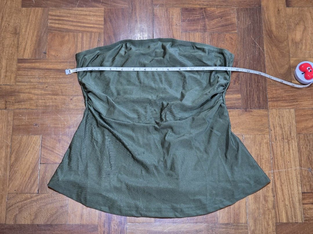 Olive Green Tube Top Peplum (Category: Sleeveless) located in Manila. Submitted by luvpeachkachu (Listing ID 1423831374, Image 2). Description: - no tags - suggest fits medium or small frames - up to 32 bust(?) - slightly stretchy .
