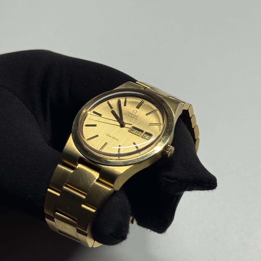 Omega Geneve Automatic Day-Date Gold Watch (Category: Luxury Watches) located in Manila. Submitted by vantageph_02 (Listing ID 1423790249, Image 2). Description: - Omega Geneve automatic watch - Gold dial - Day and date display - Gold bracelet - Omega logo on clasp and case back 36mm case size 166.0174 Newly serviced All original Pristine dial Fits up to 8" wrist size 6 months service warranty ₱55,000.