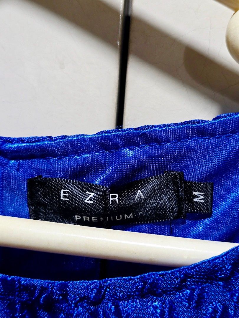 Party Graduation Dress - Royal Blue - Medium (Category: Dresses) located in Manila. Submitted by luvpeachkachu (Listing ID 1423912482, Image 3). Description: - Ezra Premium blue dress - Size M - Textured fabric - Sleeveless - Round neckline - Back zipper closure - Chest: approximately 29 inches - Perfect for special occasions.