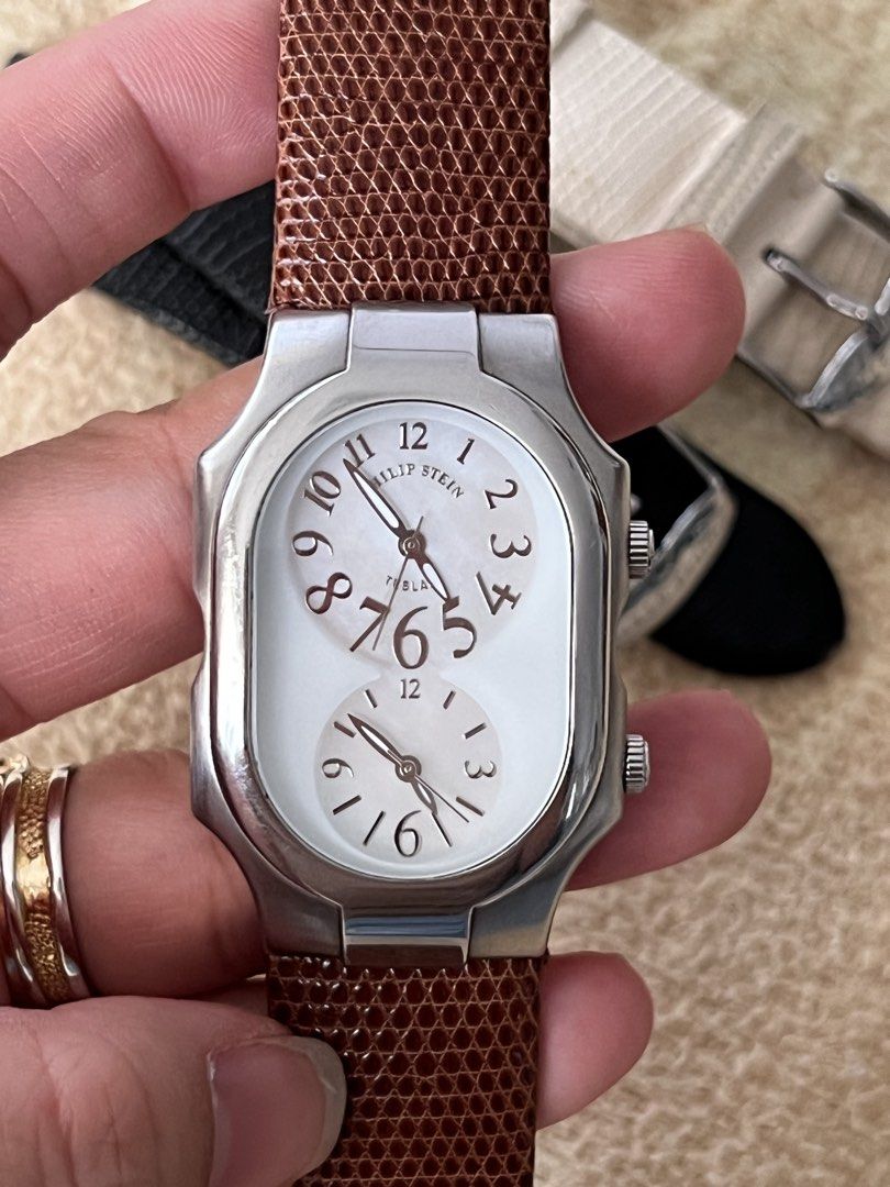 Philip Stein Teslar Watch (Category: Luxury Watches) located in Quezon City. Submitted by kdiv_ (Listing ID 1423877967, Image 2). Description: Personal Preloved | Guaranteed Authentic Teslar Quantum Technology Dual Time Serial No. 2TF028394 Watch only + 2 original Philip Stein replacement straps (White and Black) + 1 Asprey textured strap (Green) RFS: No longer being used, decluttering MOP: BDO/GCash Shipping fee to be shouldered by the buyer.