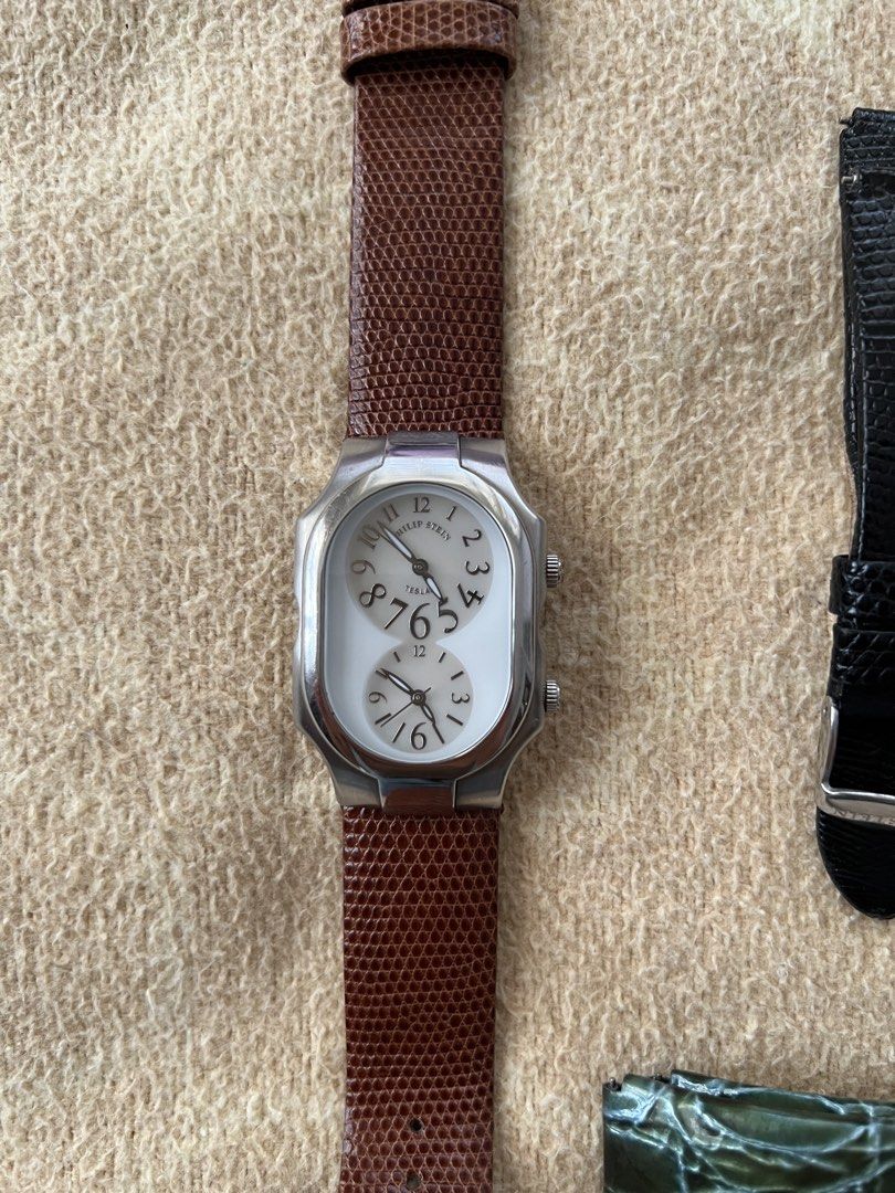 Philip Stein Teslar Watch (Category: Luxury Watches) located in Quezon City. Submitted by kdiv_ (Listing ID 1423877967, Image 1). Description: Personal Preloved | Guaranteed Authentic Teslar Quantum Technology Dual Time Serial No. 2TF028394 Watch only + 2 original Philip Stein replacement straps (White and Black) + 1 Asprey textured strap (Green) RFS: No longer being used, decluttering MOP: BDO/GCash Shipping fee to be shouldered by the buyer.