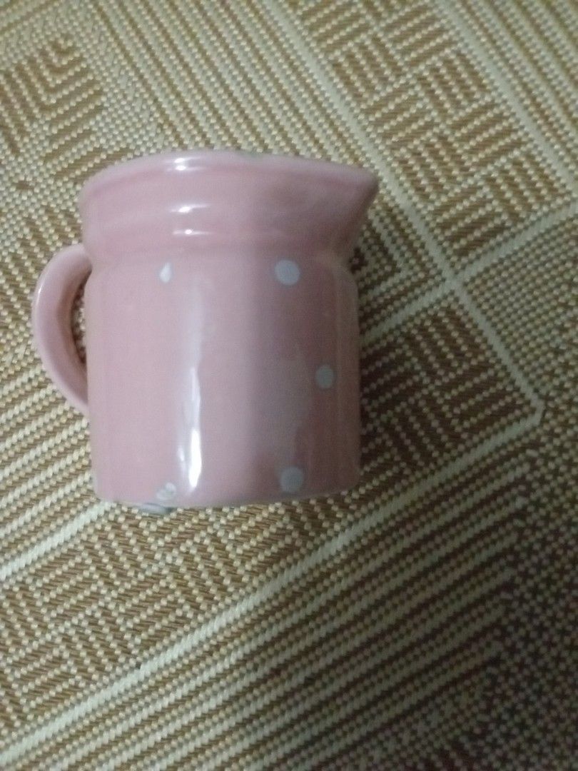 Pink Ceramic Pitcher with Polka Dots (Category: Pitchers & Dispensers) located in Manila. Submitted by padillahe35291 (Listing ID 1423933769, Image 1). Description: - Pink ceramic pitcher from 150 now 90 pesos only - White polka dot design - Features a handle and spout - Ideal for small portions - Great for beverages or flowers - Compact size - Smooth, glossy finish.