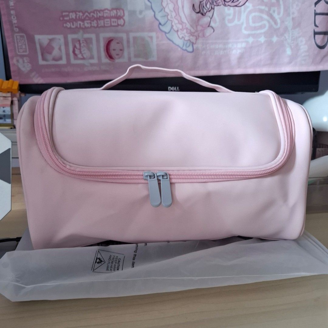 Pink Storage Bag 31.5cm (Category: Storage Boxes & Baskets) located in Quezon City. Submitted by an.marie (Listing ID 1423830676, Image 2). Description: Hey there, beauty enthusiasts! 👋 Check out this super cute Pink Travel Makeup Organizer! It's perfect for keeping all your essentials organized, whether you're traveling or just need a tidy space at home. The lovely pink color is so chic, and the design is really practical with multiple compartm