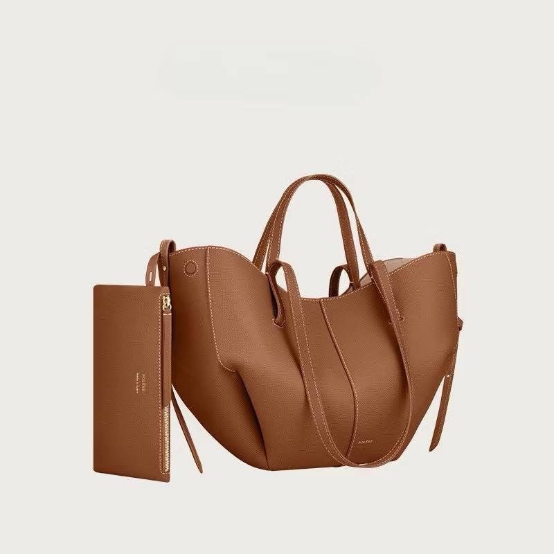 Polène Cyme tote bag (Category: Tote Bags) located in Manila. Submitted by chic.collectivemnl (Listing ID 1423872609, Image 1). Description: Comes with box and dust bag.
