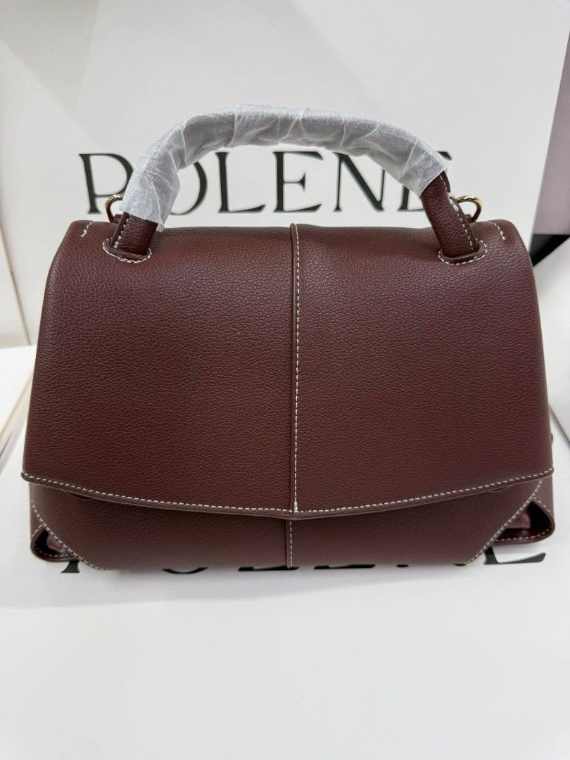 Polène Numéro Sept Handbag (Category: Luxury Bags & Wallets) located in Manila. Submitted by authenticbagswatchesco (Listing ID 1423842866, Image 1). Description: new Polene - Japan Import ₱3,750 +SF LBC COD with Dusbag box or paperbag Big size 32.5*11*24.5 pm for orders - Polène Numéro Sept handbag - Structured design with a top handle - Features a flap closure - Made of leather - Available colors: brown, beige, white, tan, red, olive green - In