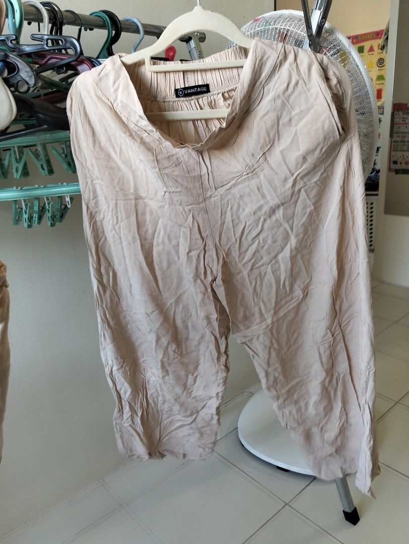 pre-loved Vantage Two-Piece Crop Top and Pants Set (Category: Sets or Coordinates) located in Muntinlupa City. Submitted by cozmovingout (Listing ID 1423854207, Image 3). Description: - Vantage two-piece set - Includes crop top and capri pants - Crop top: square neckline - Pants: elastic waistband - Color: Light peach - Fabric: Lightweight - Suitable for warm weather.