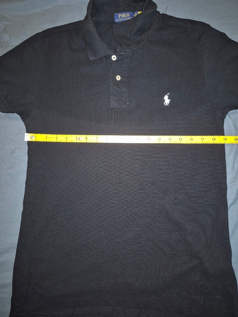 Ralph Lauren Polo Shirt Black (Category: Tshirts & Polo Shirts ) located in Muntinlupa City. Submitted by matthewdavemanuel (Listing ID 1423969911, Image 2). Description: - Black Ralph Lauren polo shirt - Features the iconic polo player logo - Color Rate 10/10 - Collared neckline and button-up placket - Classic fit - 19 inches width, 27/28.5 inches length - RFS: too small for me.