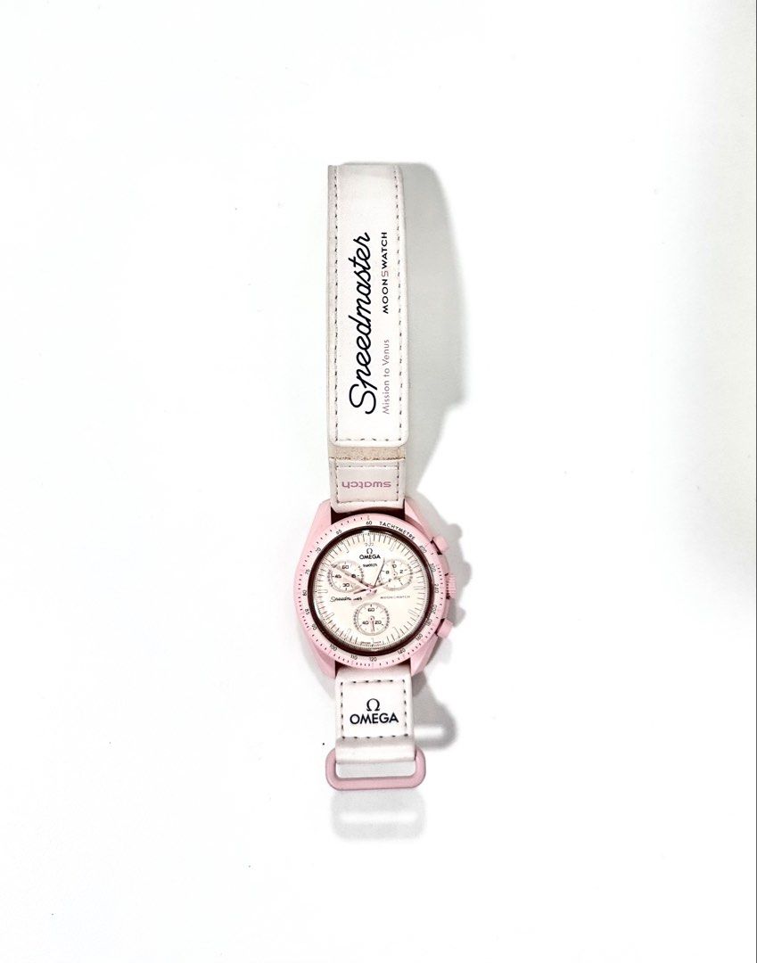 Swatch x Omega Speedmaster MoonSwatch (Category: Luxury Watches) located in Manila. Submitted by luxestuffph (Listing ID 1423829086, Image 1). Description: Swatch x Omega Speedmaster MoonSwatch - Mission to Venus. Pink case, white strap. -Used only for 2-3 times -Comes with box -100% Authentic -Purchased in Austria in 2022 -In very good condition except for the slight discoloration (dirt build up) on its strap but barely noticeable.