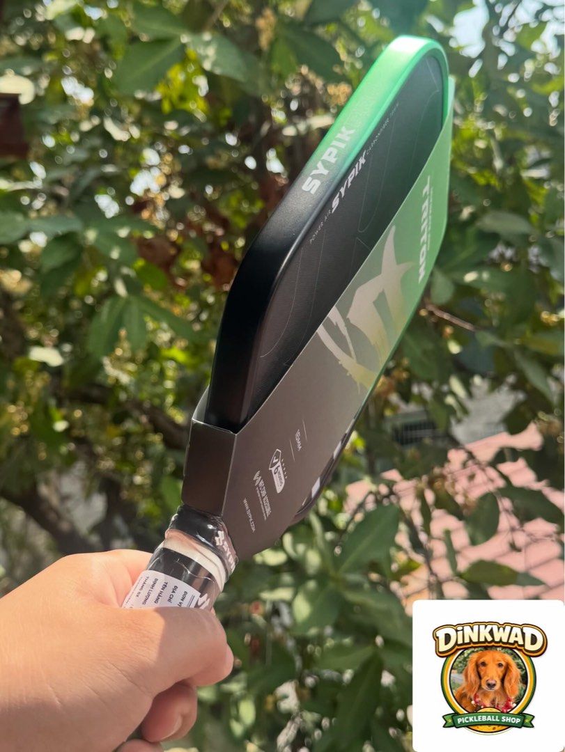 Sypik Triton 5 Matcha Glow (Category: Racket and Ball Sports) located in Santo Tomas. Submitted by umbroleda79568 (Listing ID 1423797920, Image 2). Description: Matcha Green 🍵 Soft touch. Explosive drives. On hand. Go. Send us a dm. Comes with complimentary PPF edge guard, overgrip, and paddle cover.
