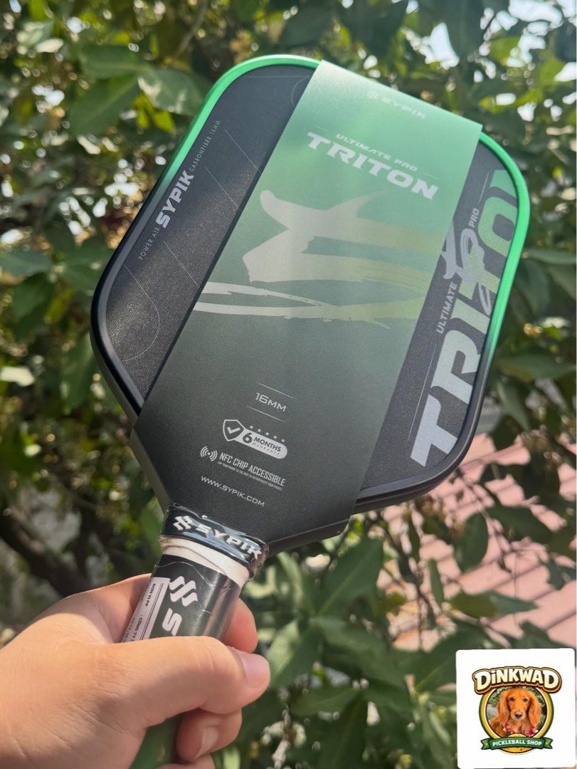 Sypik Triton 5 Matcha Glow (Category: Racket and Ball Sports) located in Santo Tomas. Submitted by umbroleda79568 (Listing ID 1423797920, Image 1). Description: Matcha Green 🍵 Soft touch. Explosive drives. On hand. Go. Send us a dm. Comes with complimentary PPF edge guard, overgrip, and paddle cover.
