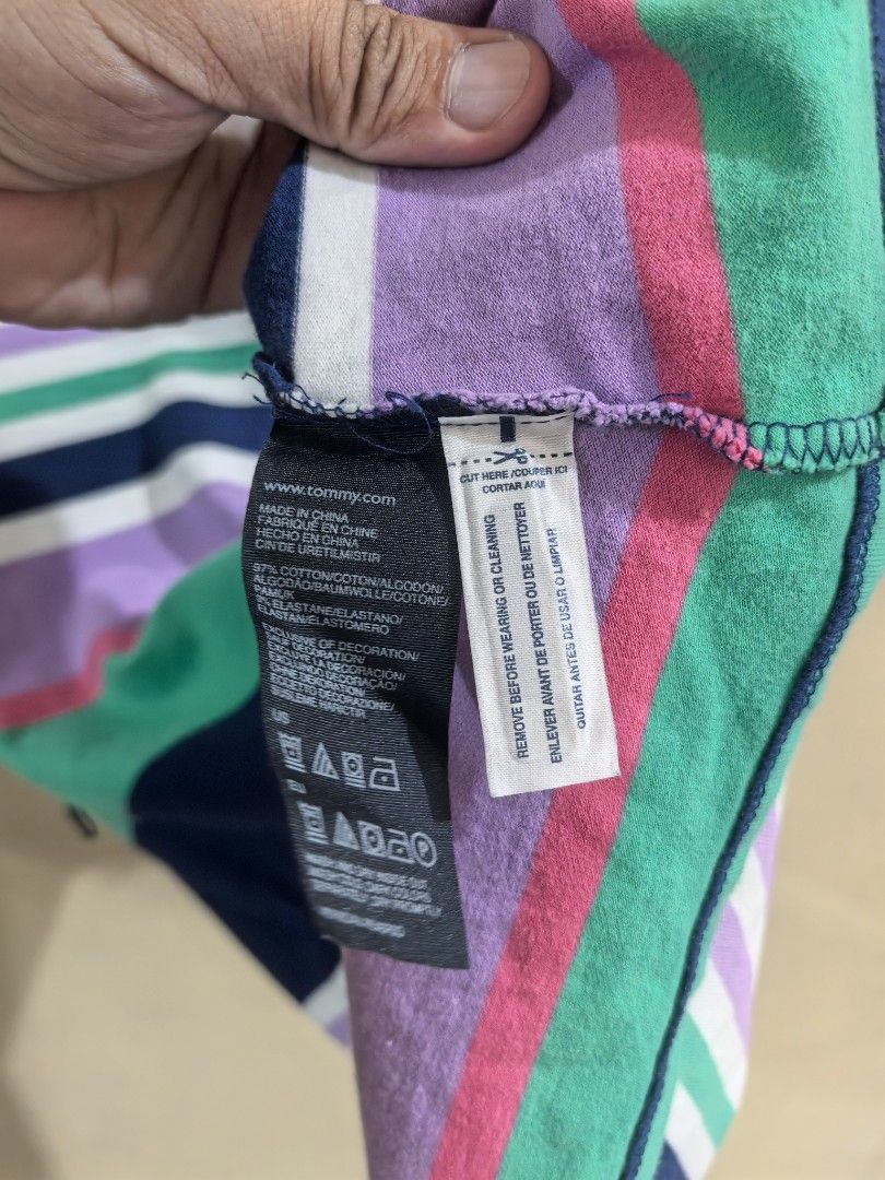 Tommy Hilfiger Striped Polo Dress (Category: Babies & Kids Fashion) located in Argao. Submitted by klay0515 (Listing ID 1423875621, Image 3). Description: - Tommy Hilfiger polo dress - Size: M (fits 8-10yrs old) - Dimension 14x29 - Design: Striped - Features: Collared neckline, three-button placket, short sleeves - Made in China - Fabric: 95% cotton, 5% elastane.