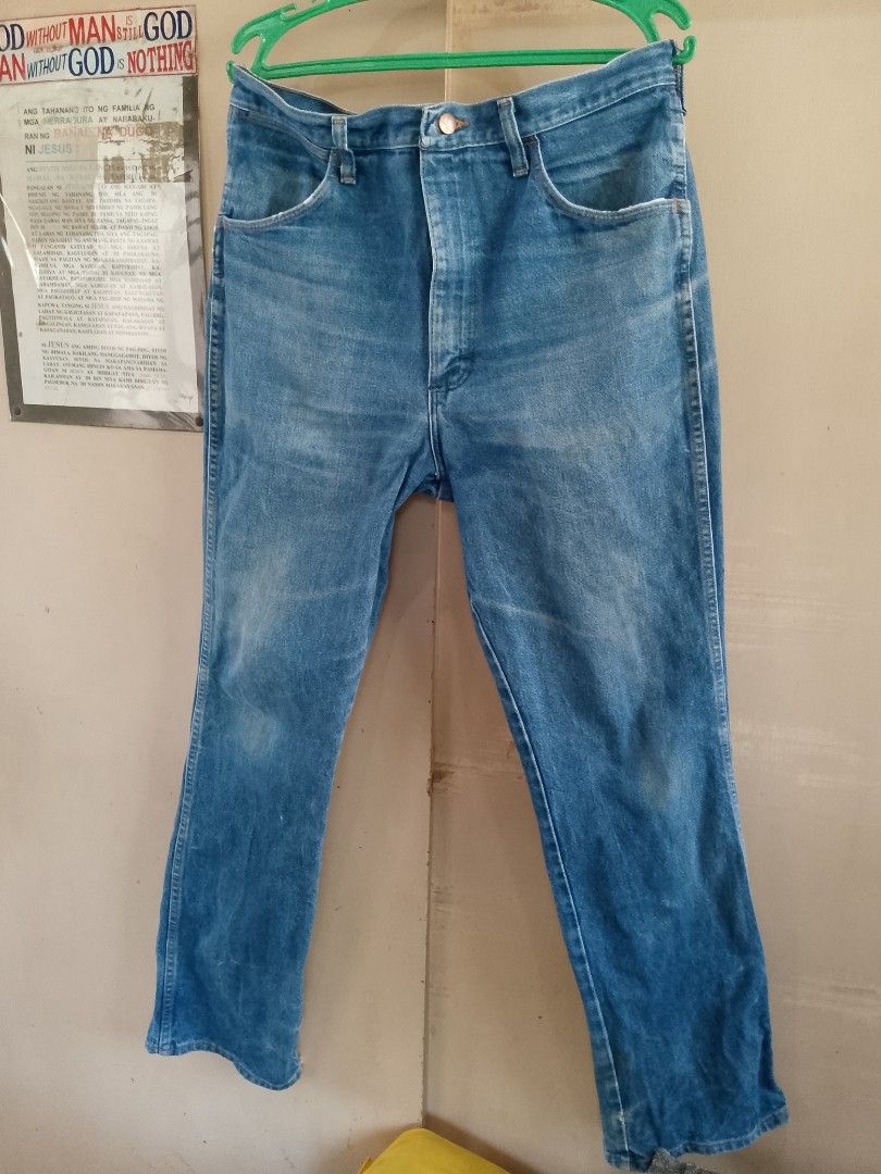 Wrangler 945 Jeans Boot Cut Cowboy Cut (Category: Jeans) located in Caloocan City. Submitted by daveherradura_02 (Listing ID 1423846495, Image 2). Description: - Authentic Wrangler jeans - Size: 36x34 on tag - Light blue wash - Classic five-pocket design - Wrangler logo patch on back pocket - Made in USA - Hem shows some wear Waist: 35 Rise: 13 Length: 44.5 Leg opening: 9.