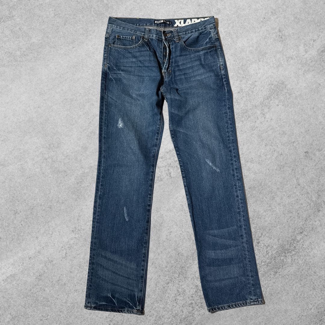XLARGE JEANS EMBROIDERED LOGO (Category: Jeans) located in San Pedro. Submitted by thriftsouthfinds (Listing ID 1423888526, Image 1). Description: Length: 45 inches Width: 19.5 inches.