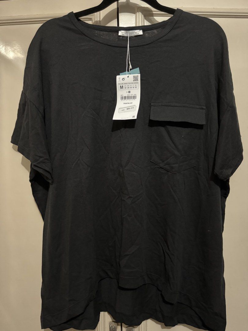 Zara Oversized Pocket T-shirt (Category: Tshirts & Polo Shirts ) located in Taguig. Submitted by batsybats (Listing ID 1423854206, Image 1). Description: BNWT oversized Long back style Negotiable.