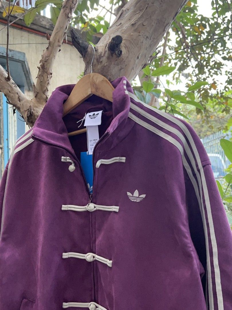 ADIDAS CNY TANG JACKET PURPLE (Category: Coats, Jackets and Outerwear) located in Taguig. Submitted by patrickbas46594 (Listing ID 1419392474, Image 2). Description: BRANDNEW WITH HANGTAG 📍 ONHAND SIZES: MEDIUM & LARGE XSMALL - XL AVAILABLE FOR PRE ORDER ✔️ COLOR MAY VARY DUE TO LIGHTING ‼️ DM ME FOR MORE DETAILS 📩 TAGUIG LOWER BICUTAN 📍.