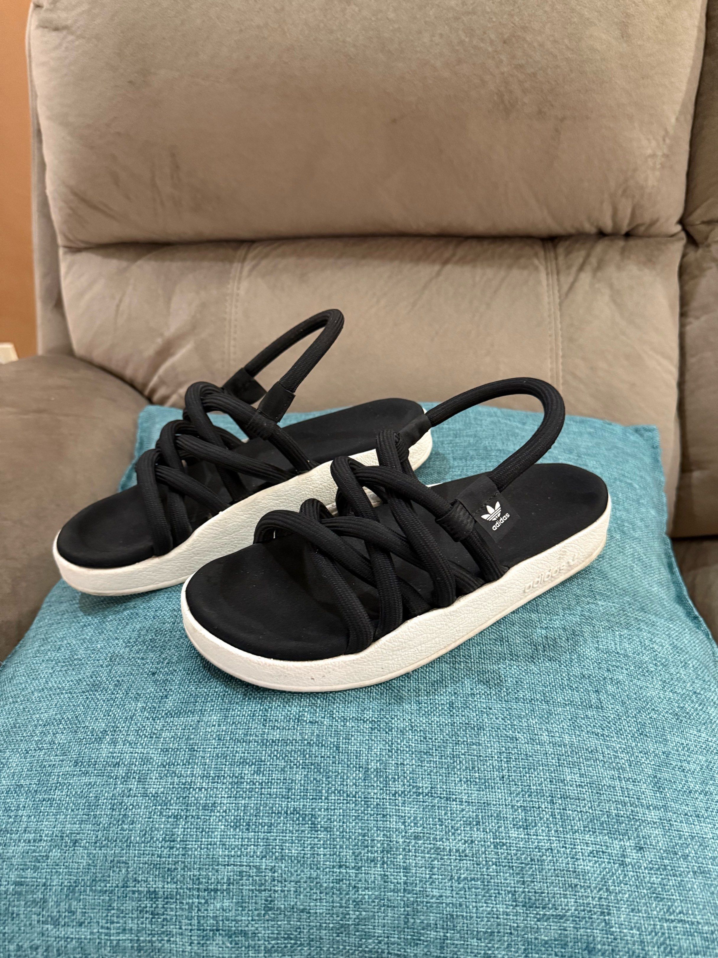 Adidas Sandals Black and White (Category: Flats & Sandals) located in Iloilo. Submitted by chocoliver1214 (Listing ID 1419423284, Image 3). Description: - Adidas sandals - Black with white soles - Unique rope-like design - Comfortable back strap - Adidas logo detail - Ideal for casual wear.