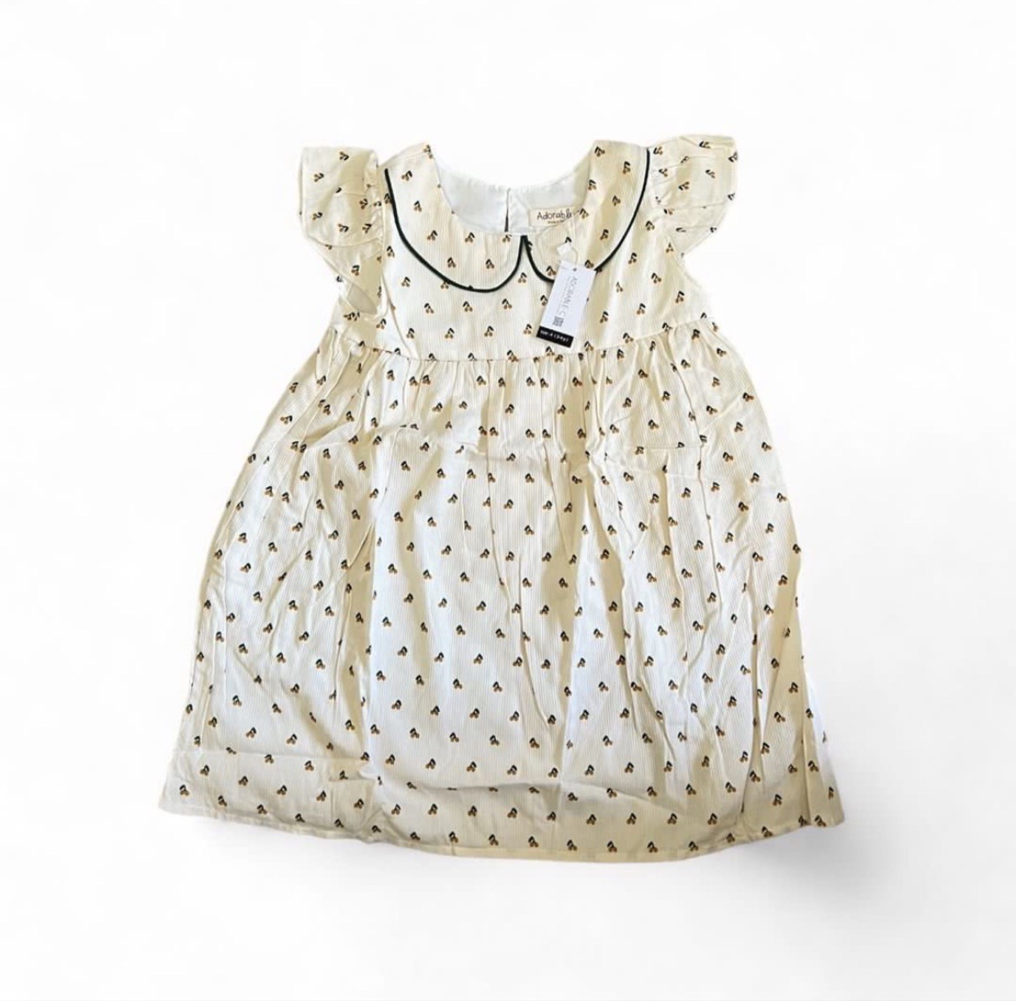 Adorable & Co. Cherry Print Dress (Category: Babies & Kids Fashion) located in Davao. Submitted by allthisandmore (Listing ID 1419441910, Image 3). Description: - Adorable & Co. dress - Cherry print - Cream color, corduroy texture - Peter Pan collar with black trim - Flutter sleeves - Size: 3-4 years old - Relaxed fit.