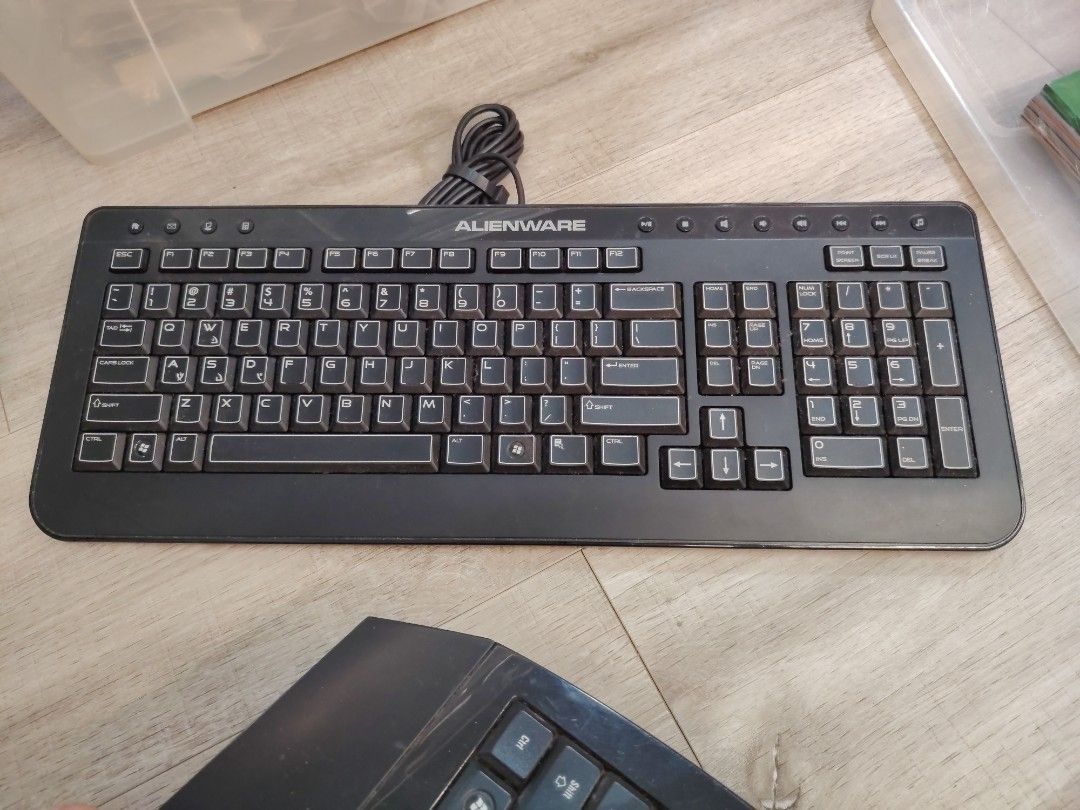 Alienware Keyboard (Category: Computer Keyboard) located in Singapore. Submitted by jtein (Listing ID 1419581237, Image 1). Description: - Used Alienware keyboard - Wired connection - Keys are visible and in working condition.