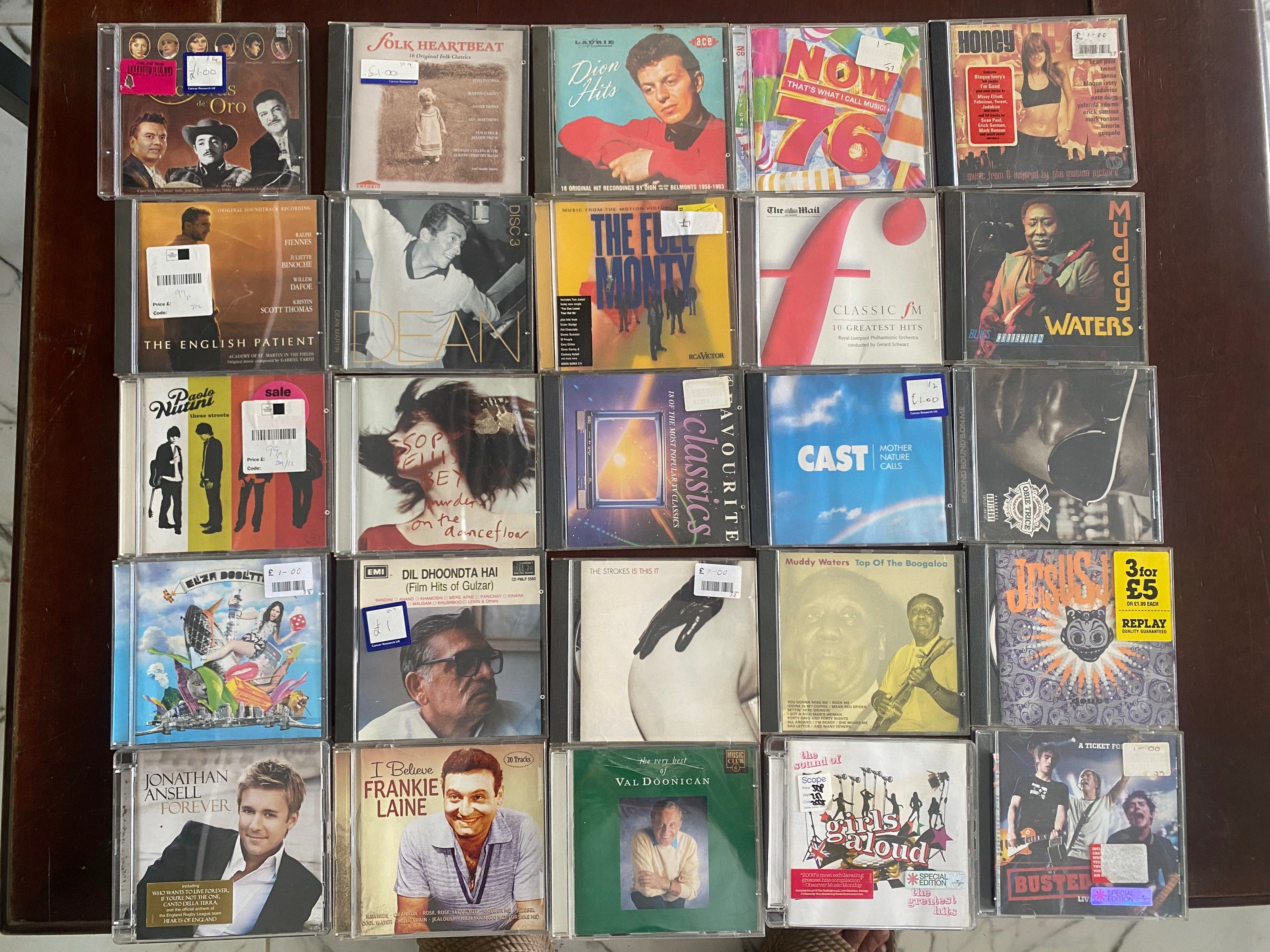 Assorted Music CDs (Category: CDs & DVDs) located in Iloilo. Submitted by TheKinfolkGarage (Listing ID 1419457175, Image 1). Description: - Assorted music CD collection - Includes various artists and genres - Some CDs are still sealed - Titles include: "The English Patient", "Frankie Lane", "Va, Dooshan", "Cast", "76", and more - Also includes Japanese CDs - Please inquire for specific titles.