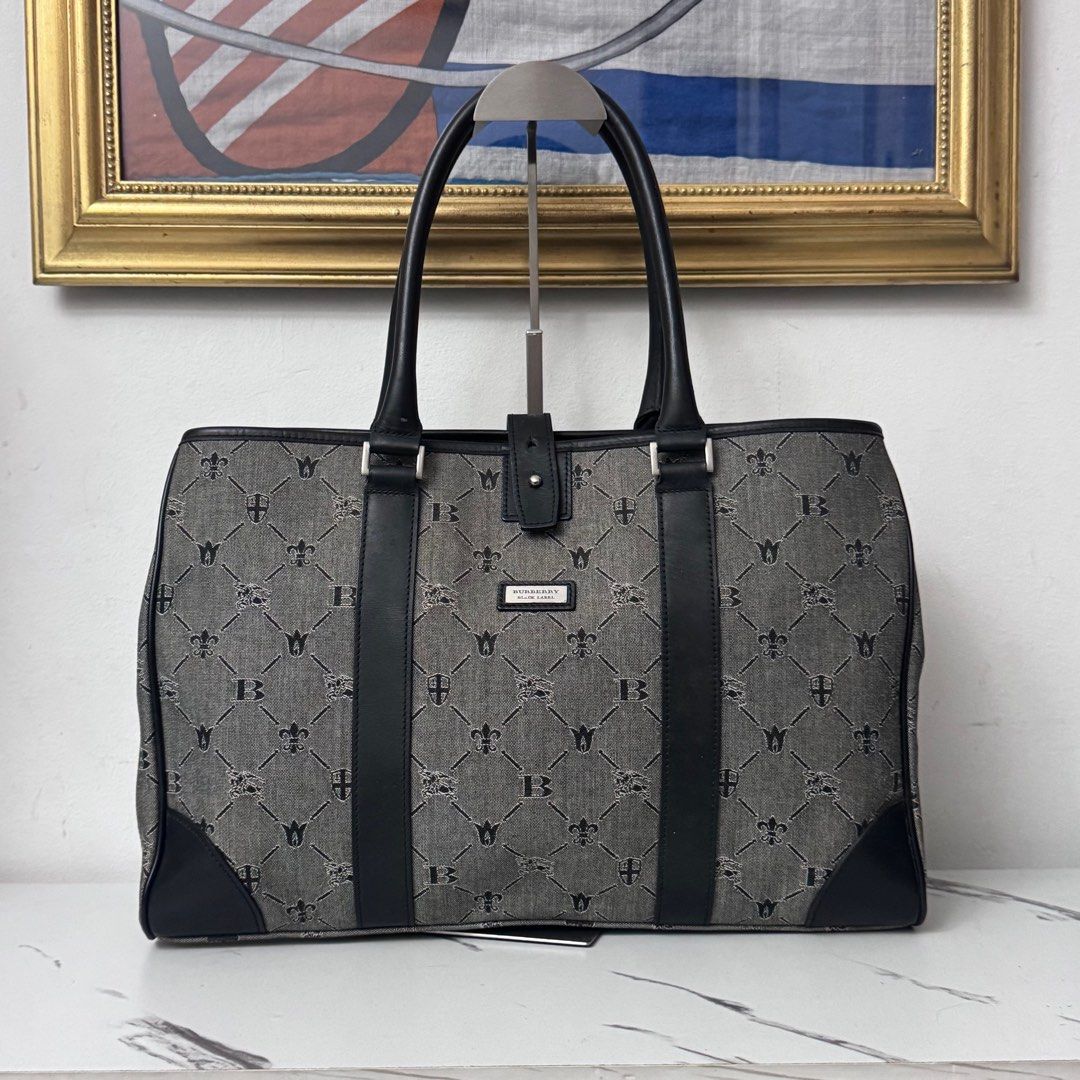 Authentic burberry messenger bag (Category: Luxury Bags & Wallets) located in Rizal. Submitted by houseofbell (Listing ID 1419495820, Image 1). Description: Excellent condition Not use My plastic cover pa yung plate Honest issue my yellow stain Na stock sa storage need spa But still wearable the stain not visible As in hindi sya halata kung hindi titigan Nasa last photo po yung picture ng stain Dimension 16x11 inches.