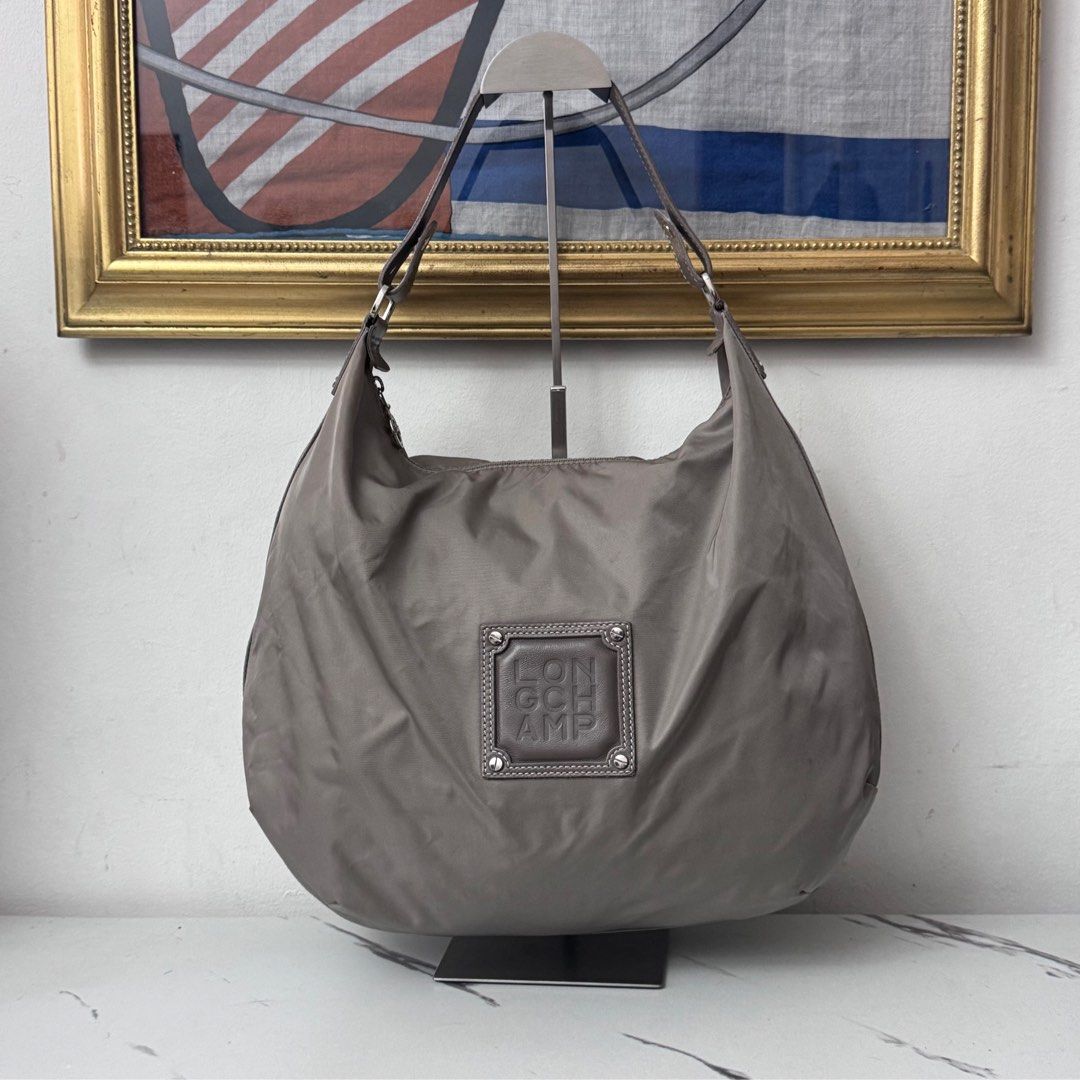 Authentic longchamp hobo bag (Category: Luxury Bags & Wallets) located in Rizal. Submitted by houseofbell (Listing ID 1419484254, Image 1). Description: Excellent condition No flaws Nylon & leather material .
