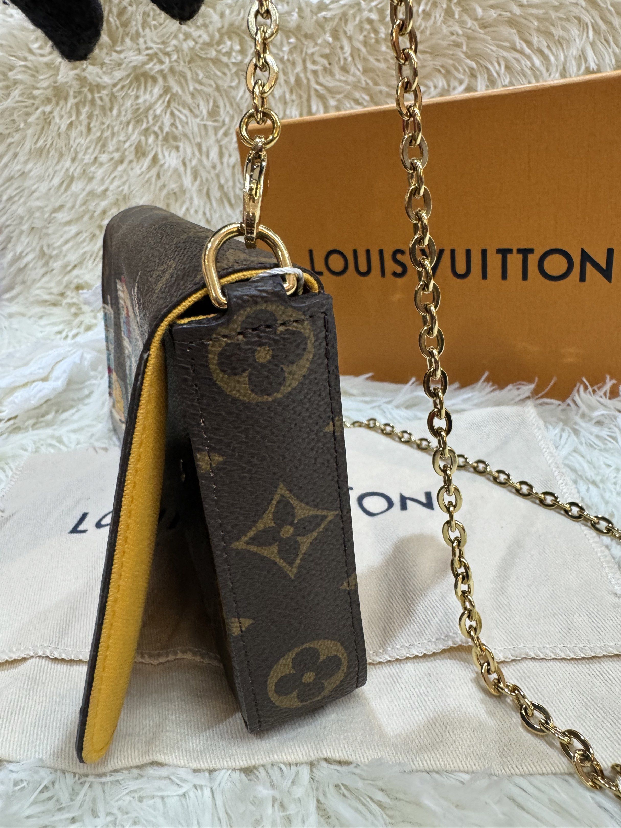 Authentic Louis Vuitton (Category: Luxury Bags & Wallets) located in Manila. Submitted by chloe_luxuries (Listing ID 1419400983, Image 3). Description: Guaranteed Original Louis Vuitton Felicie Pochette vivienne holiday monogram canvas in yellow Still in good condition Comes with dustbag and authenticity certificate Pm for more details .
