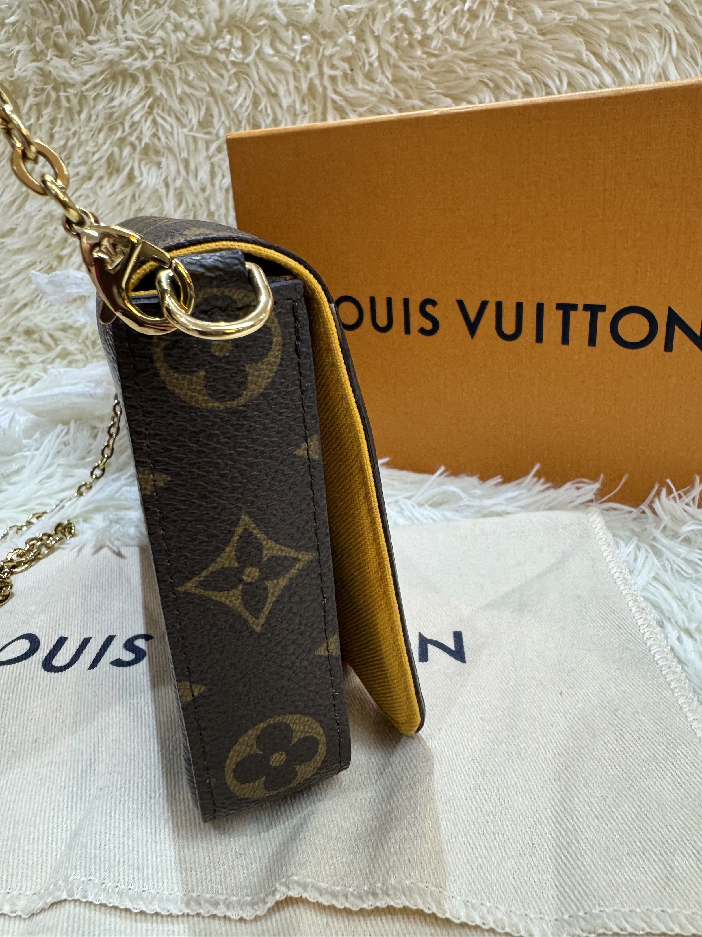 Authentic Louis Vuitton (Category: Luxury Bags & Wallets) located in Manila. Submitted by chloe_luxuries (Listing ID 1419400983, Image 2). Description: Guaranteed Original Louis Vuitton Felicie Pochette vivienne holiday monogram canvas in yellow Still in good condition Comes with dustbag and authenticity certificate Pm for more details .