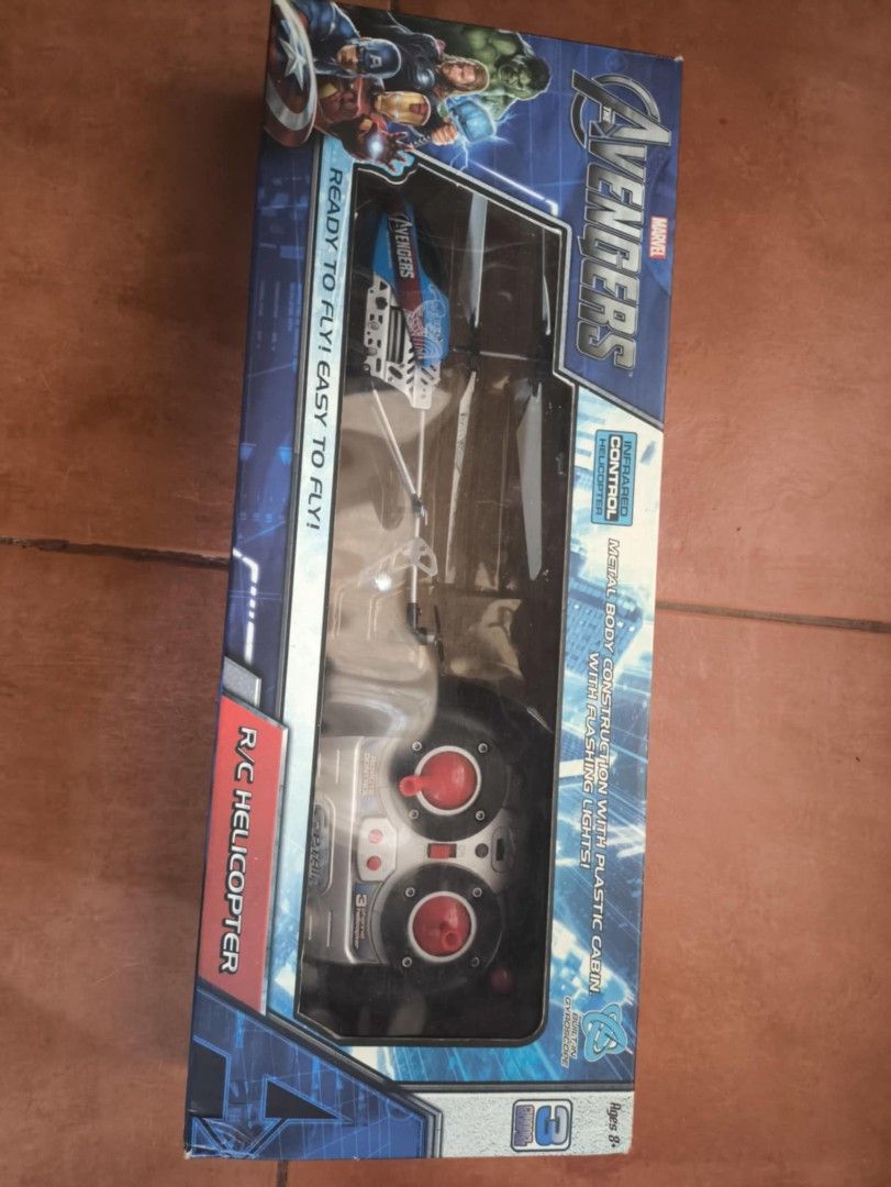 Avengers RC Helicopter (Category: Remote Control Toys) located in Bacarra. Submitted by zhongli124455 (Listing ID 1419460873, Image 1). Description: - Avengers themed RC helicopter - Includes remote control - Ready to fly and easy to play - Features a blue and white color scheme - Designed for kids.