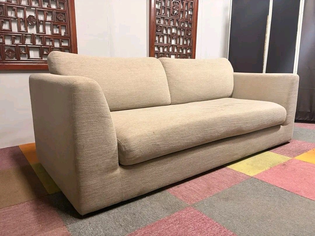 Beige Fabric Sofa (Category: Sofas) located in Manila. Submitted by eloizavill76462 (Listing ID 1419483355, Image 2). Description: - Beige fabric sofa - Two-cushion design - Wide, integrated armrests - Neutral color - Well-maintained - Ready for use.