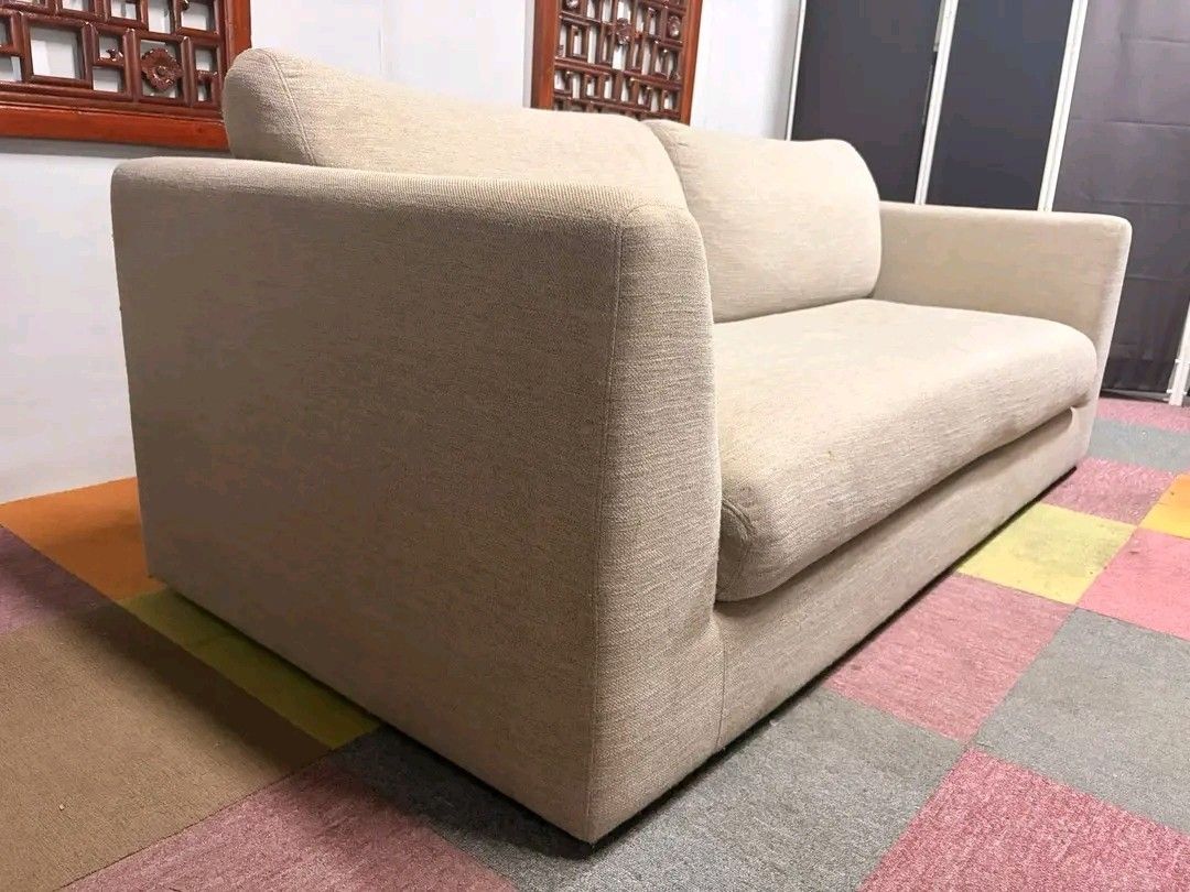 Beige Fabric Sofa (Category: Sofas) located in Manila. Submitted by eloizavill76462 (Listing ID 1419483355, Image 3). Description: - Beige fabric sofa - Two-cushion design - Wide, integrated armrests - Neutral color - Well-maintained - Ready for use.