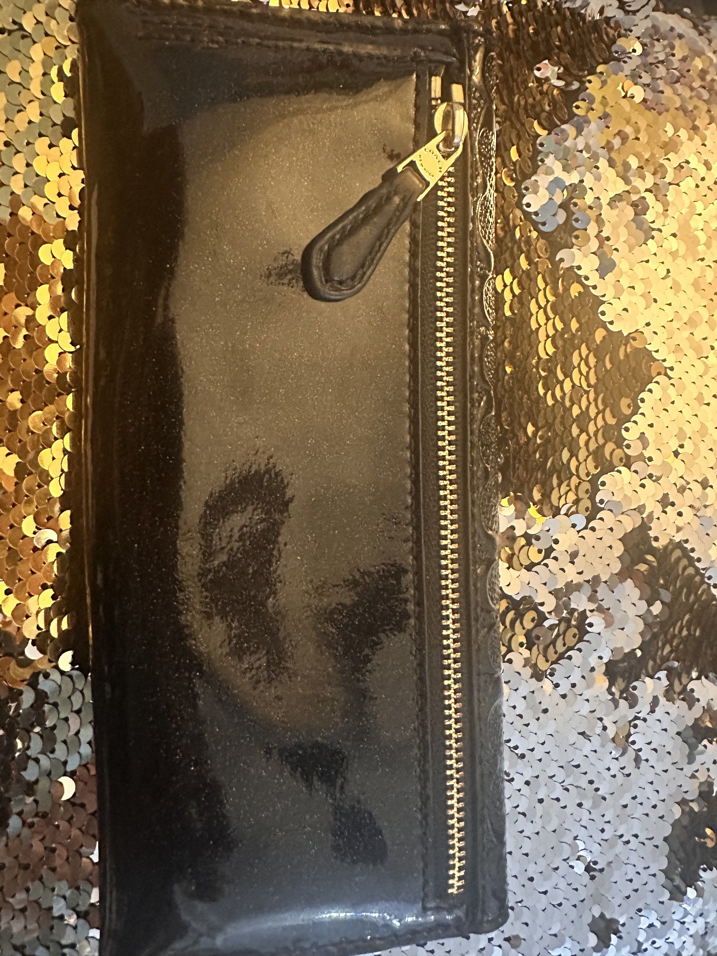 SALE - Coach Black Wallet (Category: Luxury Bags & Wallets) located in Manila. Submitted by youngdolphin-00c7ca (Listing ID 1419468908, Image 3). Description: - Authentic Coach wallet - Flap closure - Gold Coach logo - Zip pocket - Multiple card slots - Snap closure - Glossy finish - Textured pattern - Made of leather.