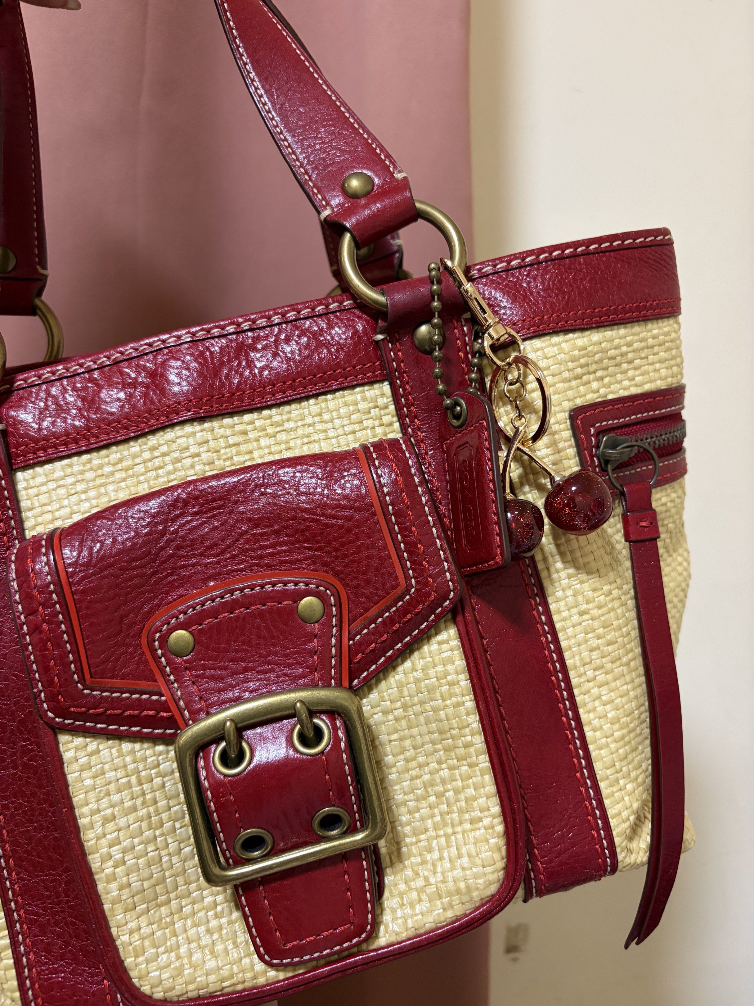 Coach Straw Tote Bag with Cherry Charm (Category: Luxury Bags & Wallets) located in Baliuag. Submitted by bagsbyaju-blueapp (Listing ID 1419392287, Image 2). Description: Clearance sale ‼️ In used but good condition With signs of use Bawal sa maselan.