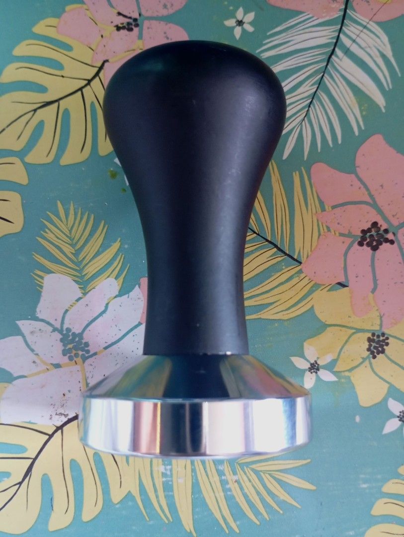 Coffee Tamper (Category: Coffee & Tea Tableware) located in Quezon City. Submitted by an.marie (Listing ID 1419549424, Image 1). Description: Black-handled coffee tamper with a silver base. Perfect for espresso. Durable and built to last..