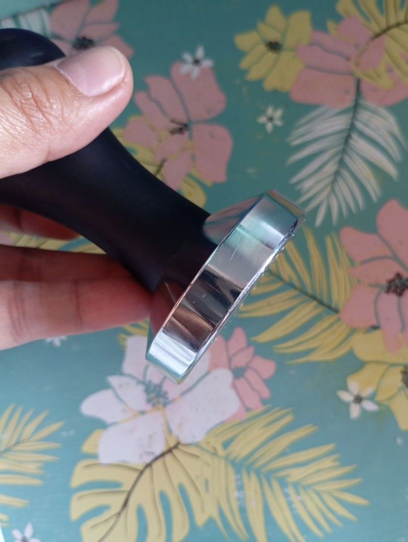 Coffee Tamper (Category: Coffee & Tea Tableware) located in Quezon City. Submitted by an.marie (Listing ID 1419549424, Image 2). Description: Black-handled coffee tamper with a silver base. Perfect for espresso. Durable and built to last..