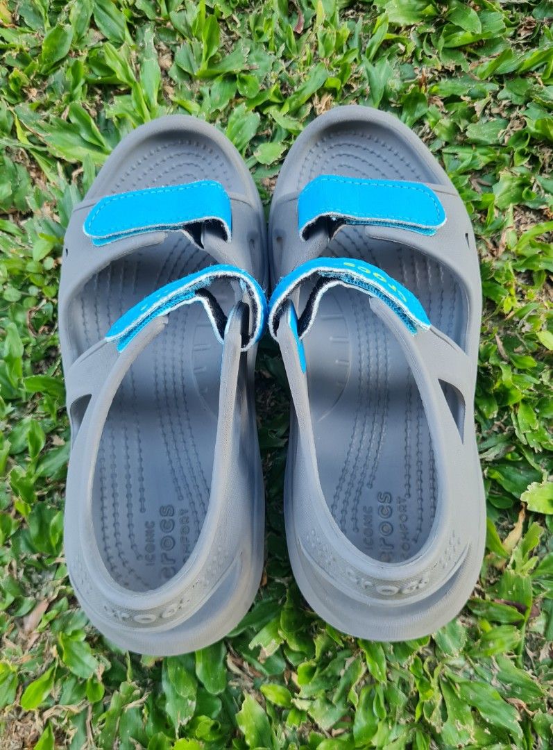 Crocs Kids Swiftwater River Sandals (Category: Babies & Kids Fashion) located in Cavite. Submitted by helpusdeclutter (Listing ID 1419487439, Image 3). Description: Crocs Kids Swiftwater River Sandals Store bought. Gray with Blue velcro Straps Size J2 - 20.8 cm in great condition. Super comfy! SRP: P2,745. Selling for P500 only. not available in stores anymore. Great for casual wear, camping and other adventures!.