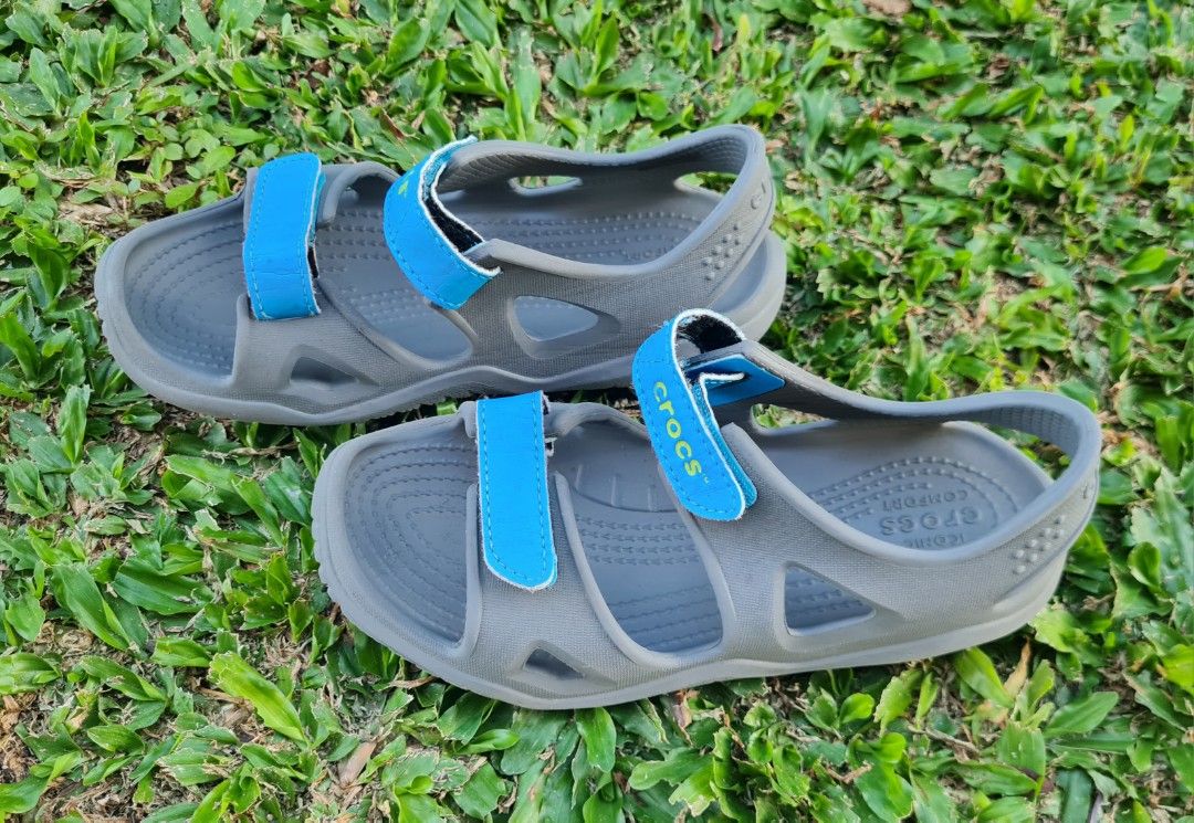 Crocs Kids Swiftwater River Sandals (Category: Babies & Kids Fashion) located in Cavite. Submitted by helpusdeclutter (Listing ID 1419487439, Image 2). Description: Crocs Kids Swiftwater River Sandals Store bought. Gray with Blue velcro Straps Size J2 - 20.8 cm in great condition. Super comfy! SRP: P2,745. Selling for P500 only. not available in stores anymore. Great for casual wear, camping and other adventures!.
