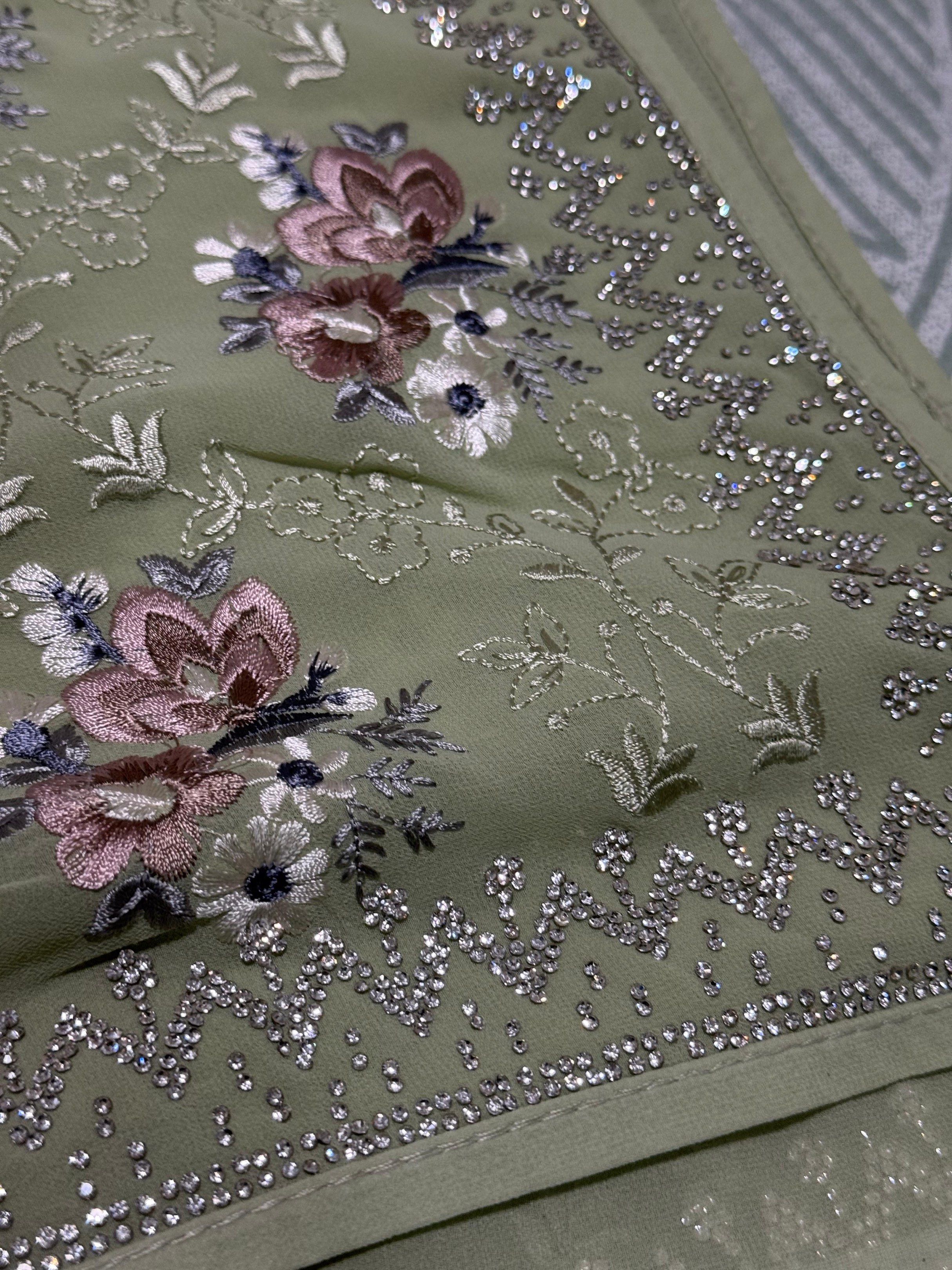 Designer Saree (Category: Traditional & Ethnic wear) located in Singapore. Submitted by neesha23 (Listing ID 1419464310, Image 2). Description: - Designer saree - Features floral embroidery and beadwork - Lovely green color - Brand new with tag - Original price: $118 .