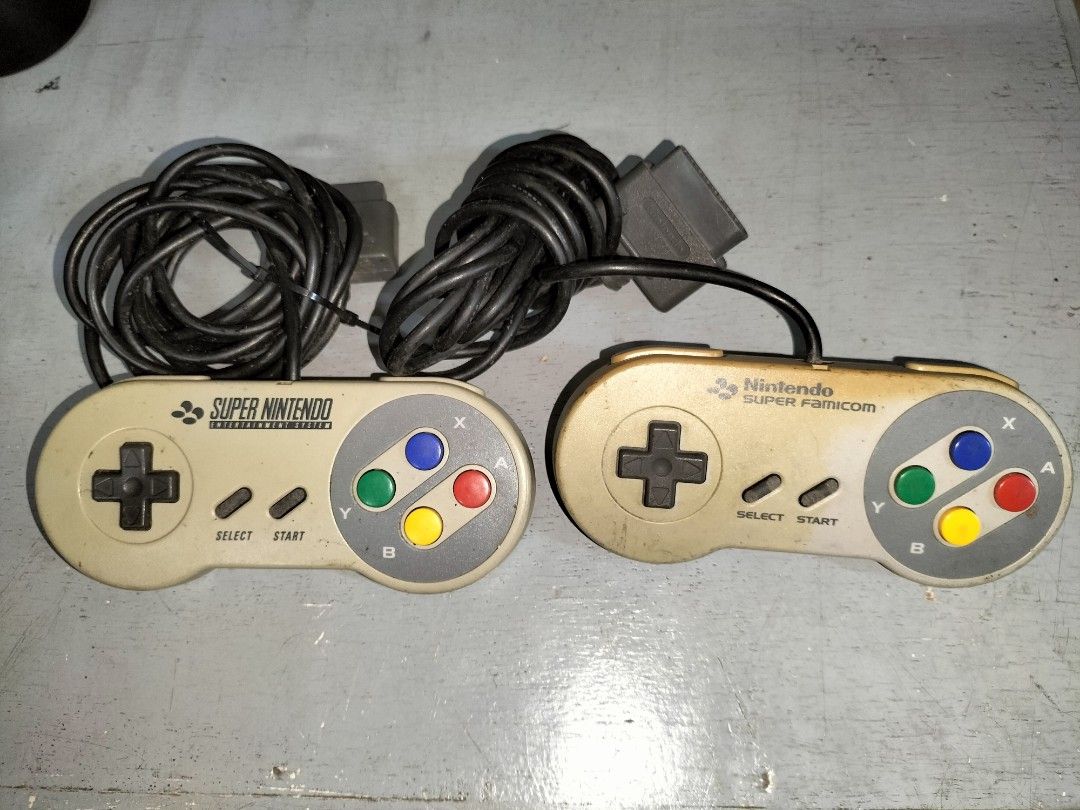Dreamcast, Xbox, SNES/SFC Controllers AND ETC (Category: Controllers) located in Balanga. Submitted by gioden (Listing ID 1419448596, Image 2). Description: Untested - White Dreamcast controller broken analog stick - working - Xbox controller - Wing Commander controller no dongle - Snes/SFc Controller hard wires - working - PS2 Remote no dongle - working BUNDLE P700 Mode of Payment: GCASH or PAYMAYA Courier: LBC, J&T or JRS Express Shipping Fee w
