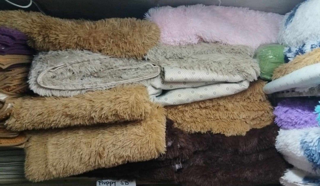 Fluffy Furry Carpet 5x6ft (Category: Bedding & Towels) located in Manila. Submitted by yzlshop (Listing ID 1419462081, Image 1). Description: - Soft and fluffy carpet - Available in many colors - Features a furry texture - Non-slip backing - Perfect for couch or bed.