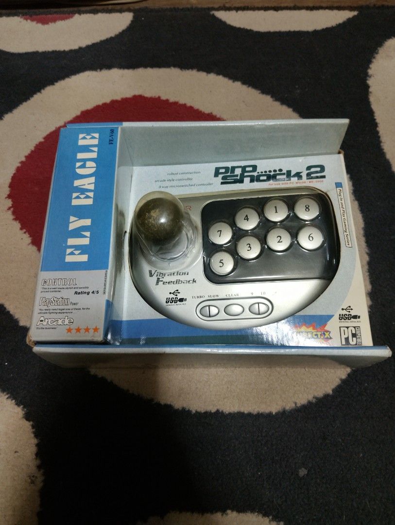 Fly Eagle Pro Shock 2 Arcade Joystick (Category: Controllers) located in Manila. Submitted by boyhet.thrift15 (Listing ID 1419523150, Image 1). Description: classic arcade stick (pro shock 2 /Fly Eagle)USB pluggin issue ung knob my konting scratch un lang issue. selling 800.